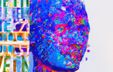 Photograph of art objects: a blue head, a human sculpture, a window.